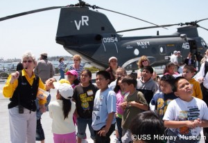 Children enjoying a visit to the aircraft carrier museum